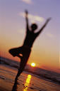 Woman in sunrise